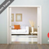 A modern sliding pocket door with a white frame opens to a living room with a white sofa, orange cushion, artwork, and vase. Banner shows "New 70mm frame" and FD30 symbol—ideal for ECLISSE Pocket Door System - Classic Double Fire-Rated.