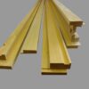 Several pieces from the ECLISSE Classic Fire-Rated Pocket Door Kit – Single, featuring light-coloured wooden trim ideal for finishing pocket or sliding doors, are displayed side by side on a grey background.