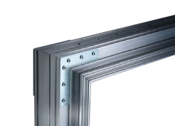A close-up of the ECLISSE Pocket Door System - Syntesis® Single Wiring-Ready metal frame corner, joined by a silver L-shaped bracket and screws, highlighting the structure and connection details against a white background.