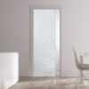 A modern room with light wood flooring, a white sideboard, two tall vases, and an ECLISSE Pocket Door Systems - Classic Single Glass Door with a white wavy pattern. A white dining table and chair sit in natural light from outside.