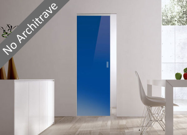 Modern interior featuring a blue ECLISSE Syntesis® Flush (No Architrave) 10mm Glass Pocket Door System Coloured, white walls, wood floor, minimal furnishings. A grey diagonal banner reads “No Architrave.”.