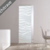 Sliding glass pocket door with white wave patterns, set in a plain wall without architrave, separates a modern dining area. Text: No Architrave. Featuring ECLISSE Syntesis® 10mm Flush Glass Pocket Door System Plain or Patterned.