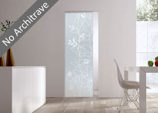 A modern interior with ECLISSE Syntesis® 10mm Flush Glass Pocket Door System (patterned glass). Architrave-free frame. White dining set on the right; light wood floors and white walls complete the clean look. Text: No Architrave.