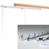 The ECLISSE Wall Mounted Sliding Door Kit and Pelmet- 2m Track- Paris 2 includes a wooden track cover, a metal rail, and installation components. Protective-wrapped rail, small parts, and instructions are included—perfect for pocket doors and ECLISSE systems.