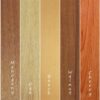 Seven vertical wood samples labelled Cherry Walnut, Mahogany, Oak, Beech, Walnut, Cherry, and Wenge showcase unique grains and colours—ideal for use with the Eclisse Pocket Door System - CURVED DOUBLE.