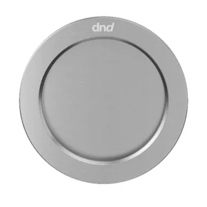 A round, flat, silver metal CASSIOPEIA Round Flush Pull Handle Set for sliding pocket doors featuring a circular recessed centre and a dnd logo at the top.